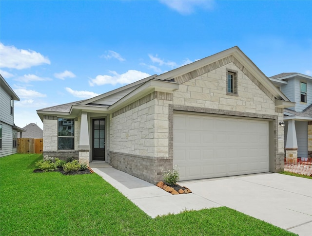 18414 Christine Elizabeth Ln, New Caney, TX 77357 - view of front facade featuring concrete driveway, stone siding, and an attached garage