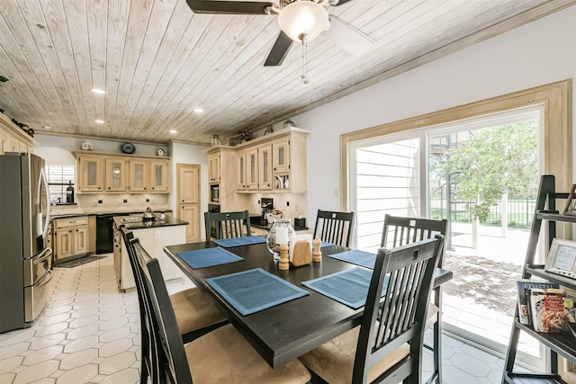 8410 Atascocita Lake Way, Humble, TX 77346 - dining area with wood ceiling, healthy amount of natural light, recessed lighting, ornamental molding, and a ceiling fan