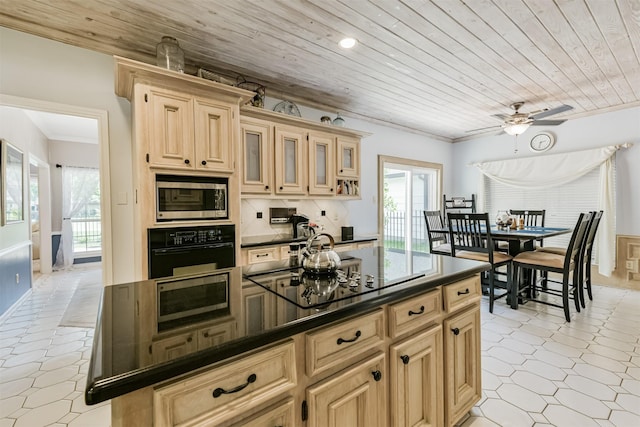 8410 Atascocita Lake Way, Humble, TX 77346 - kitchen featuring black appliances, dark countertops, healthy amount of natural light, wooden ceiling, and ceiling fan