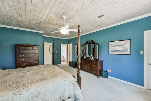 8410 Atascocita Lake Way, Humble, TX 77346 - carpeted bedroom with wooden ceiling, ornamental molding, baseboards, ceiling fan, and ensuite bathroom