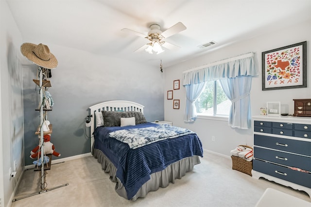 8410 Atascocita Lake Way, Humble, TX 77346 - bedroom with carpet floors, baseboards, and ceiling fan