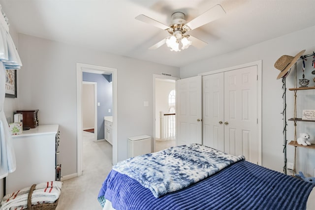 8410 Atascocita Lake Way, Humble, TX 77346 - bedroom with a closet, light colored carpet, and a ceiling fan