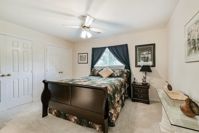 8410 Atascocita Lake Way, Humble, TX 77346 - bedroom featuring light colored carpet, ceiling fan, and baseboards