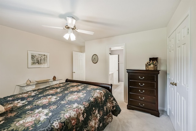 8410 Atascocita Lake Way, Humble, TX 77346 - bedroom with light carpet, ceiling fan, a closet, and ensuite bath