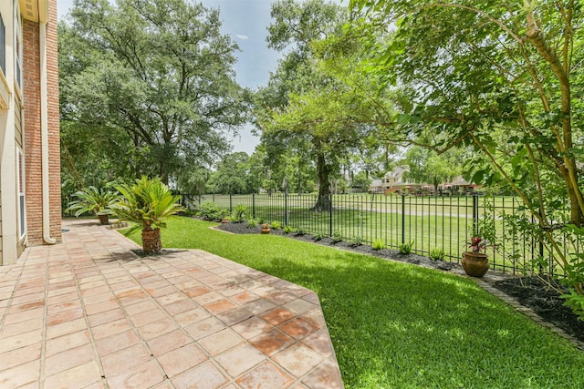 8410 Atascocita Lake Way, Humble, TX 77346 - view of yard featuring a patio area