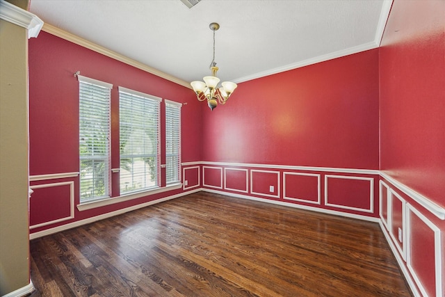 10707 Mandavilla Dr, Houston, TX 77095 - spare room with a chandelier, crown molding, wood finished floors, wainscoting, and a decorative wall