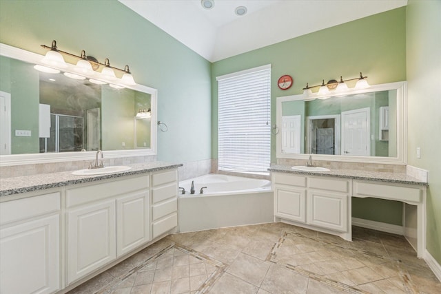10707 Mandavilla Dr, Houston, TX 77095 - bathroom with two vanities, a garden tub, a stall shower, and inlaid floor details