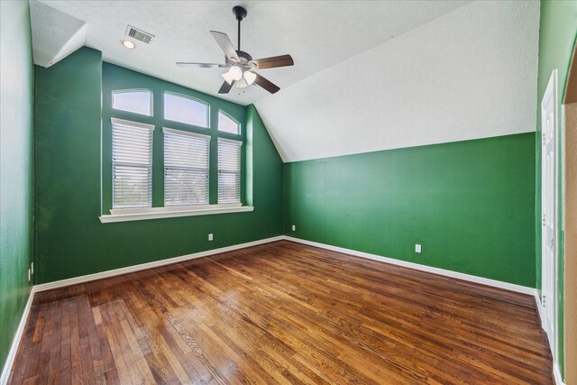 10707 Mandavilla Dr, Houston, TX 77095 - bonus room featuring vaulted ceiling, ceiling fan, wood-type flooring, and baseboards