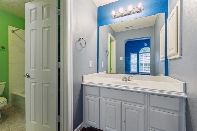 10707 Mandavilla Dr, Houston, TX 77095 - bathroom featuring toilet, vanity, and tub / shower combination