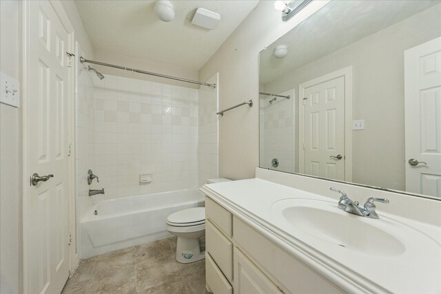 10707 Mandavilla Dr, Houston, TX 77095 - bathroom with vanity, bathtub / shower combination, and toilet