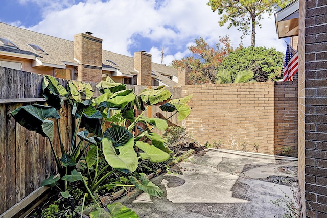 13948 Hollowgreen Dr Unit 25, Houston, TX 77082 - view of patio featuring fence