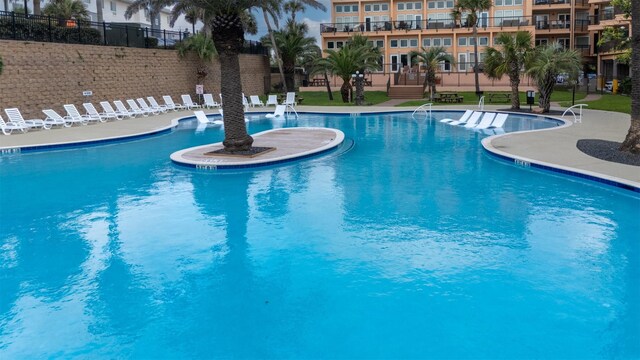 9520 Seawall Blvd Unit 152, Galveston, TX 77554 - community pool featuring fence