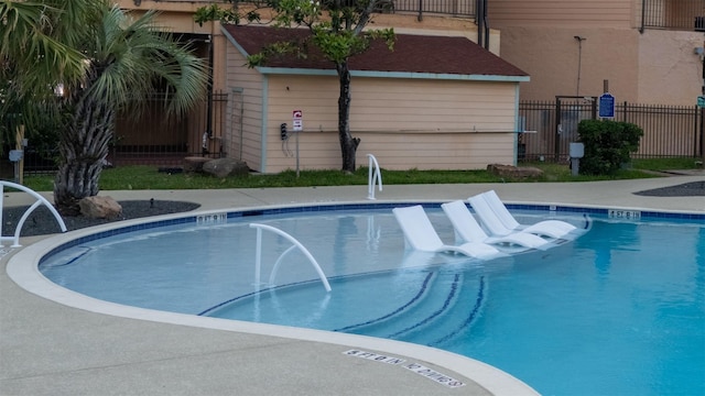 9520 Seawall Blvd Unit 152, Galveston, TX 77554 - community pool with fence