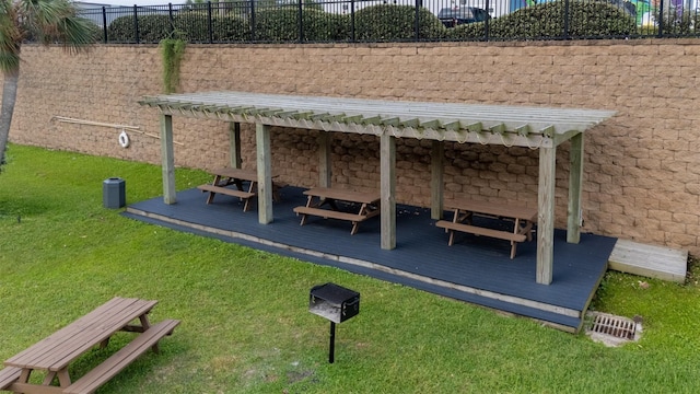 9520 Seawall Blvd Unit 152, Galveston, TX 77554 - view of property's community featuring a wooden deck and a pergola