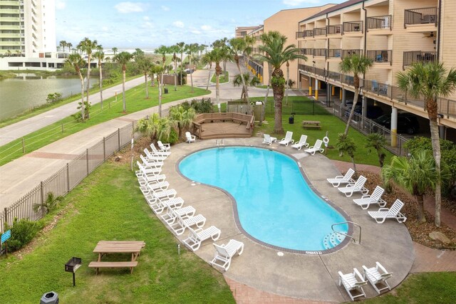 9520 Seawall Blvd Unit 152, Galveston, TX 77554 - community pool with a patio and a water view