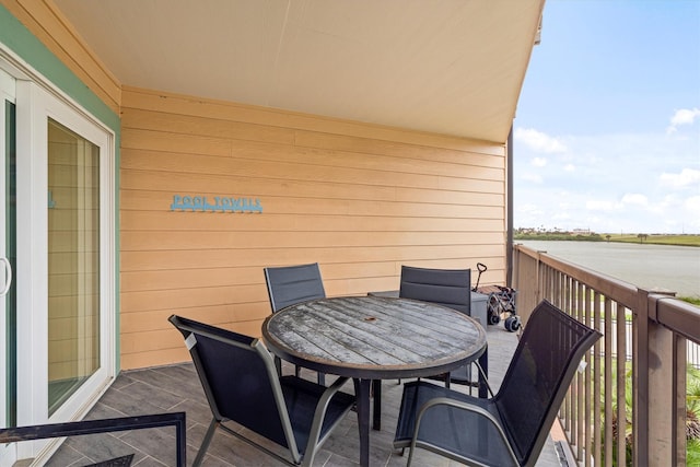 9520 Seawall Blvd Unit 152, Galveston, TX 77554 - balcony featuring outdoor dining area and a water view