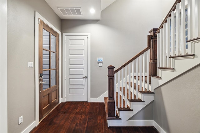 1032 W 18th St, Houston, TX 77008 - foyer featuring wood finished floors, baseboards, and stairway