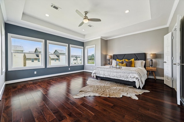 1032 W 18th St, Houston, TX 77008 - bedroom featuring a tray ceiling, wood finished floors, baseboards, crown molding, and recessed lighting