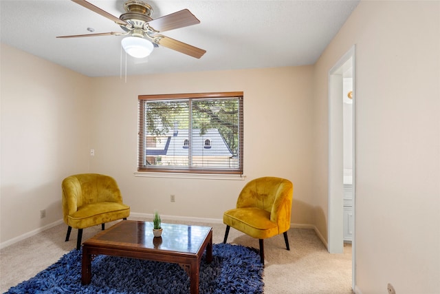 22015 Fielder Dr, Katy, TX 77450 - living area with light carpet, baseboards, and a ceiling fan