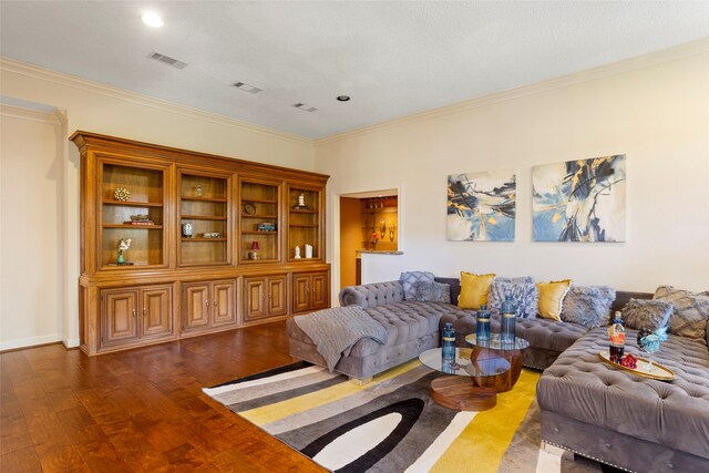 22015 Fielder Dr, Katy, TX 77450 - living area featuring ornamental molding, dark wood-style floors, and recessed lighting