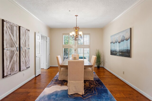 22015 Fielder Dr, Katy, TX 77450 - dining room featuring a chandelier, a textured ceiling, wood finished floors, crown molding, and baseboards