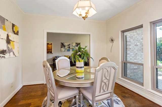 22015 Fielder Dr, Katy, TX 77450 - dining room with dark wood finished floors, ornamental molding, and baseboards