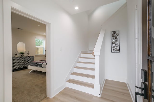 5703 Balbo St Unit B, Houston, TX 77091 - stairs with wood finished floors, baseboards, and recessed lighting