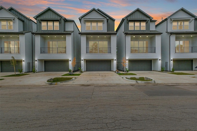 5703 Balbo St Unit B, Houston, TX 77091 - multi unit property featuring board and batten siding, an attached garage, and driveway