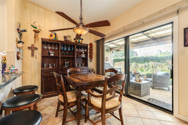 38 Adler Cir, Galveston, TX 77551 - dining space featuring ceiling fan and wooden walls