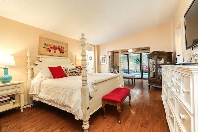 38 Adler Cir, Galveston, TX 77551 - bedroom with vaulted ceiling, dark wood-type flooring, and access to outside