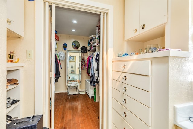 38 Adler Cir, Galveston, TX 77551 - walk in closet featuring wood finished floors
