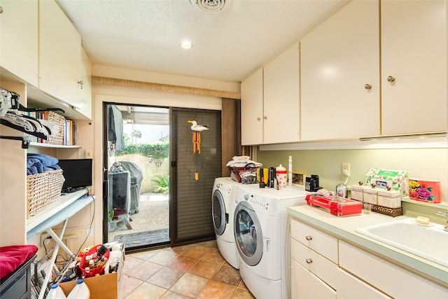 38 Adler Cir, Galveston, TX 77551 - laundry area featuring cabinet space and washer and dryer