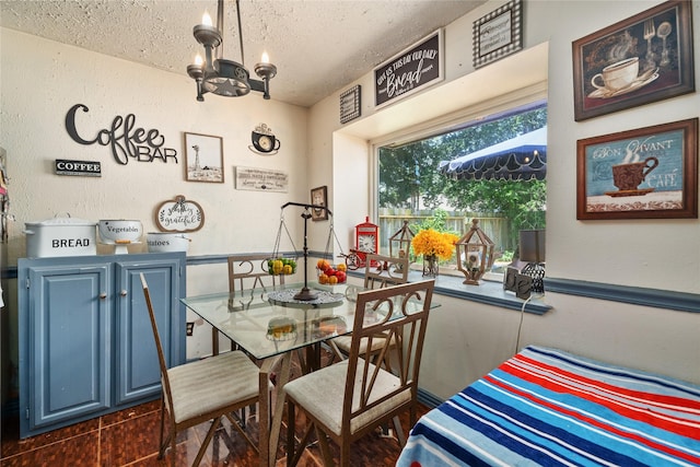 4931 Glendower Dr, Spring, TX 77373 - dining room with a textured ceiling and a chandelier