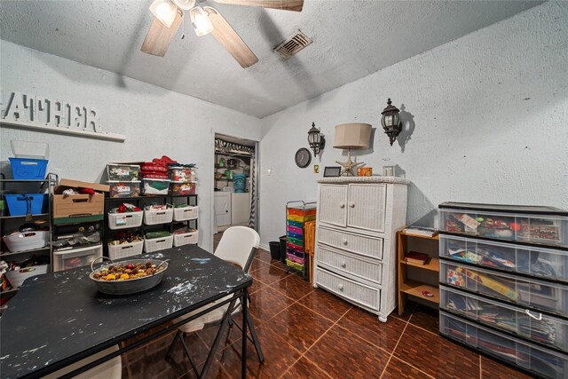4931 Glendower Dr, Spring, TX 77373 - tiled dining space featuring a textured wall, ceiling fan, and a textured ceiling