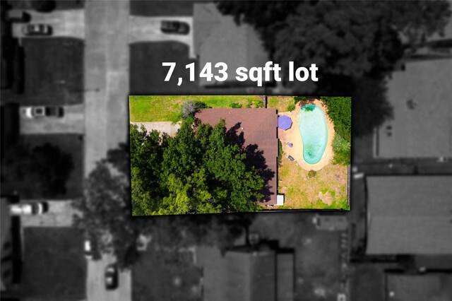 4931 Glendower Dr, Spring, TX 77373 - aerial view of property and surrounding area featuring a pool and property boundaries highlighted