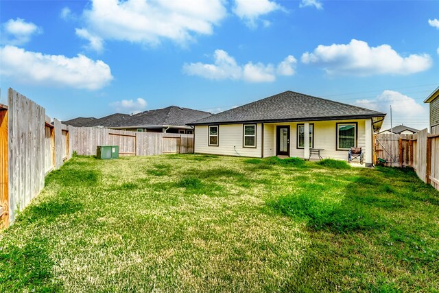31611 Farlam Farms Trl, Fulshear, TX 77441 - rear view of property with a shingled roof