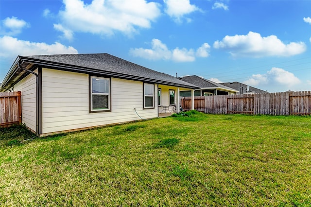 31611 Farlam Farms Trl, Fulshear, TX 77441 - rear view of property with roof with shingles and a patio