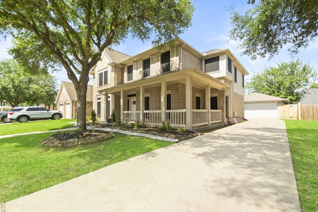 4914 Fern Cove Dr, Baytown, TX 77521 - view of front facade with brick siding, a porch, and a garage