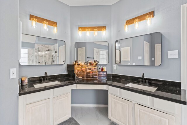 4914 Fern Cove Dr, Baytown, TX 77521 - bathroom with a stall shower, double vanity, and marble finish flooring