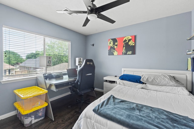 4914 Fern Cove Dr, Baytown, TX 77521 - bedroom featuring baseboards, dark wood-style floors, a desk, and ceiling fan