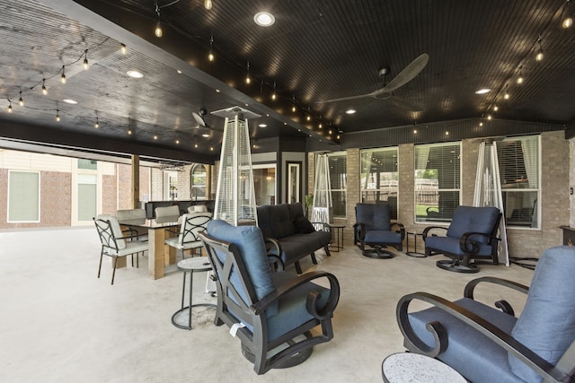4914 Fern Cove Dr, Baytown, TX 77521 - view of patio / terrace with ceiling fan, outdoor dining space, and an outdoor living space