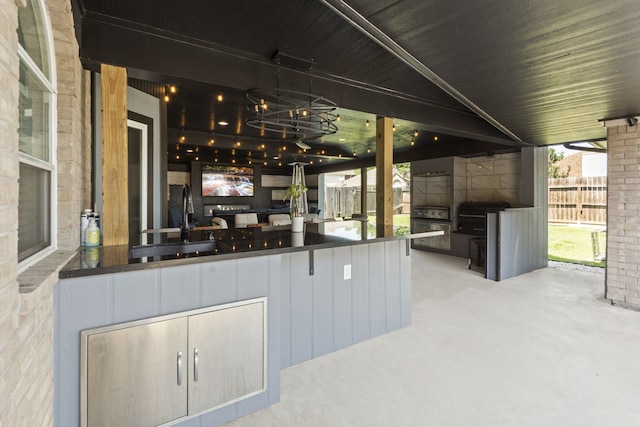 4914 Fern Cove Dr, Baytown, TX 77521 - view of patio / terrace with a sink and a grill