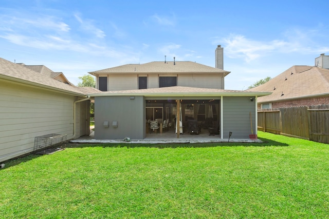 4914 Fern Cove Dr, Baytown, TX 77521 - rear view of house with a patio and a chimney