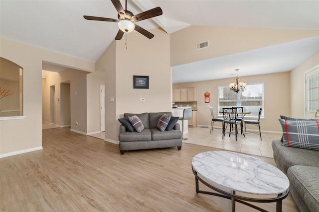 8123 Solara Bnd, Houston, TX 77083 - living area with a ceiling fan, high vaulted ceiling, a chandelier, baseboards, and beam ceiling