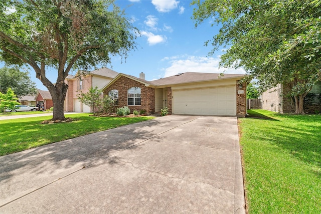 8123 Solara Bnd, Houston, TX 77083 - view of front facade featuring brick siding, driveway, an attached garage, and a chimney