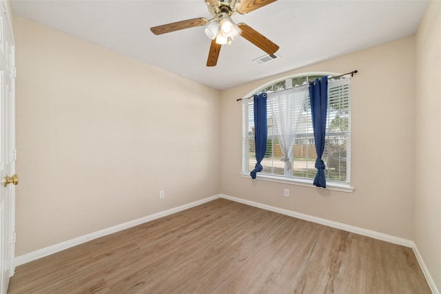 8123 Solara Bnd, Houston, TX 77083 - spare room featuring light wood finished floors, baseboards, and ceiling fan