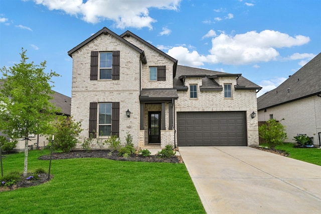 510 Rita Blanca Dr, Webster, TX 77598 - view of front of home with concrete driveway, a front yard, brick siding, and a garage
