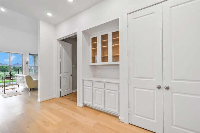 510 Rita Blanca Dr, Webster, TX 77598 - hallway featuring light wood-style floors, recessed lighting, and baseboards
