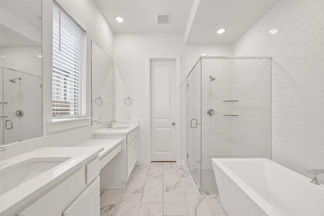 510 Rita Blanca Dr, Webster, TX 77598 - full bath featuring marble look tiles, a stall shower, vanity, a freestanding bath, and recessed lighting