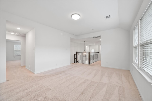 510 Rita Blanca Dr, Webster, TX 77598 - unfurnished living room with light colored carpet and baseboards